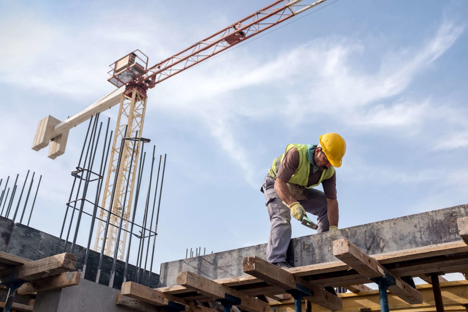 Skilled Construction Laborer Worker At Construction Site