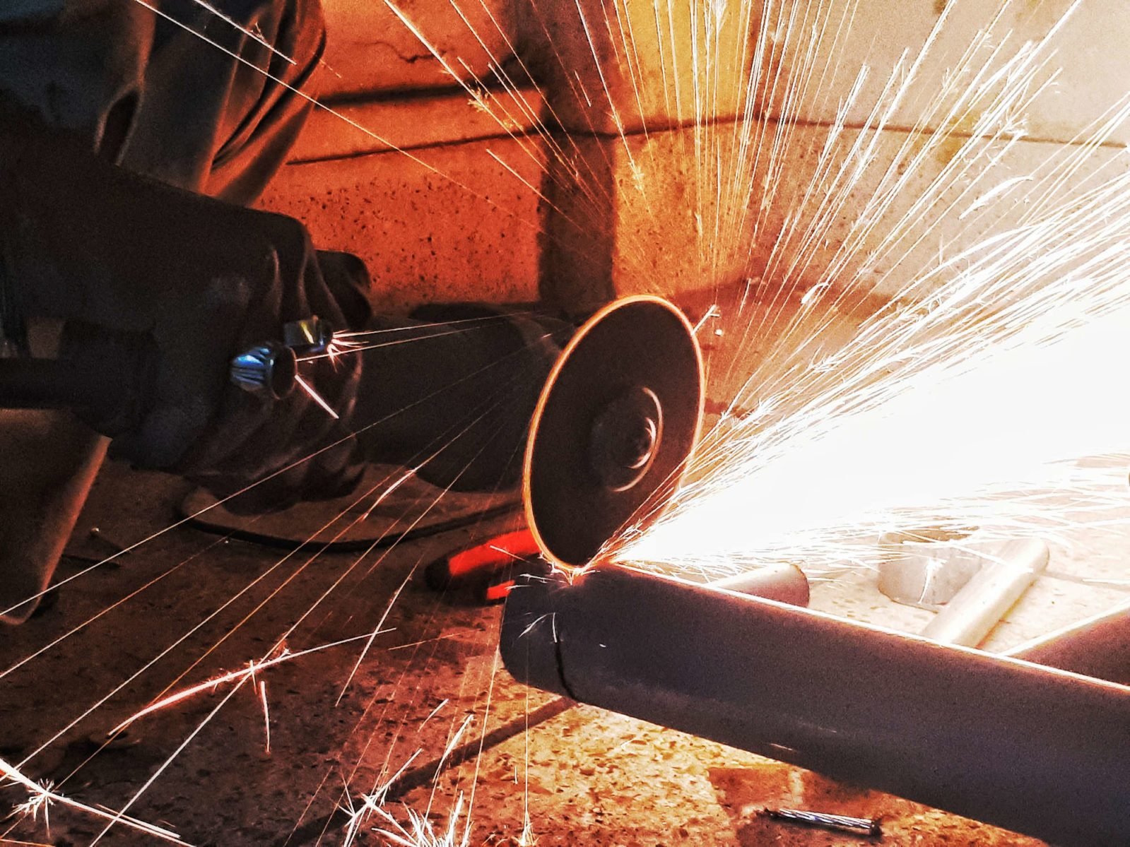 Skilled laborer working on a pipe