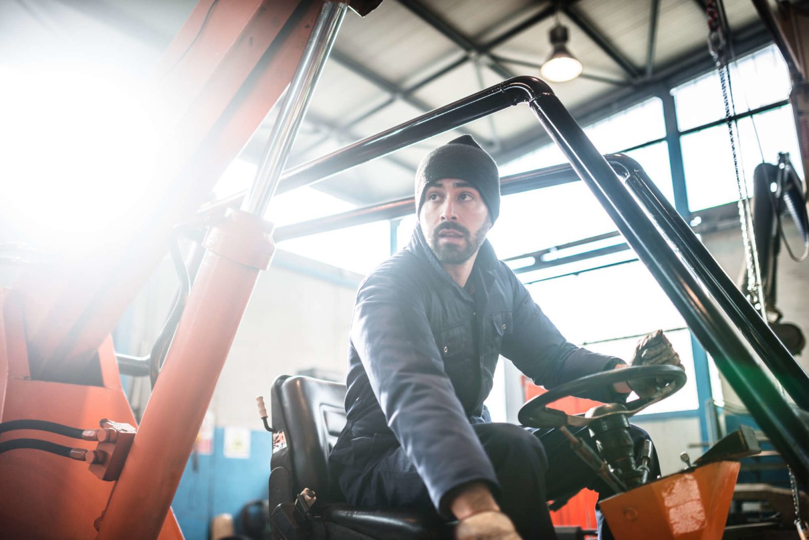 man driving a forklift