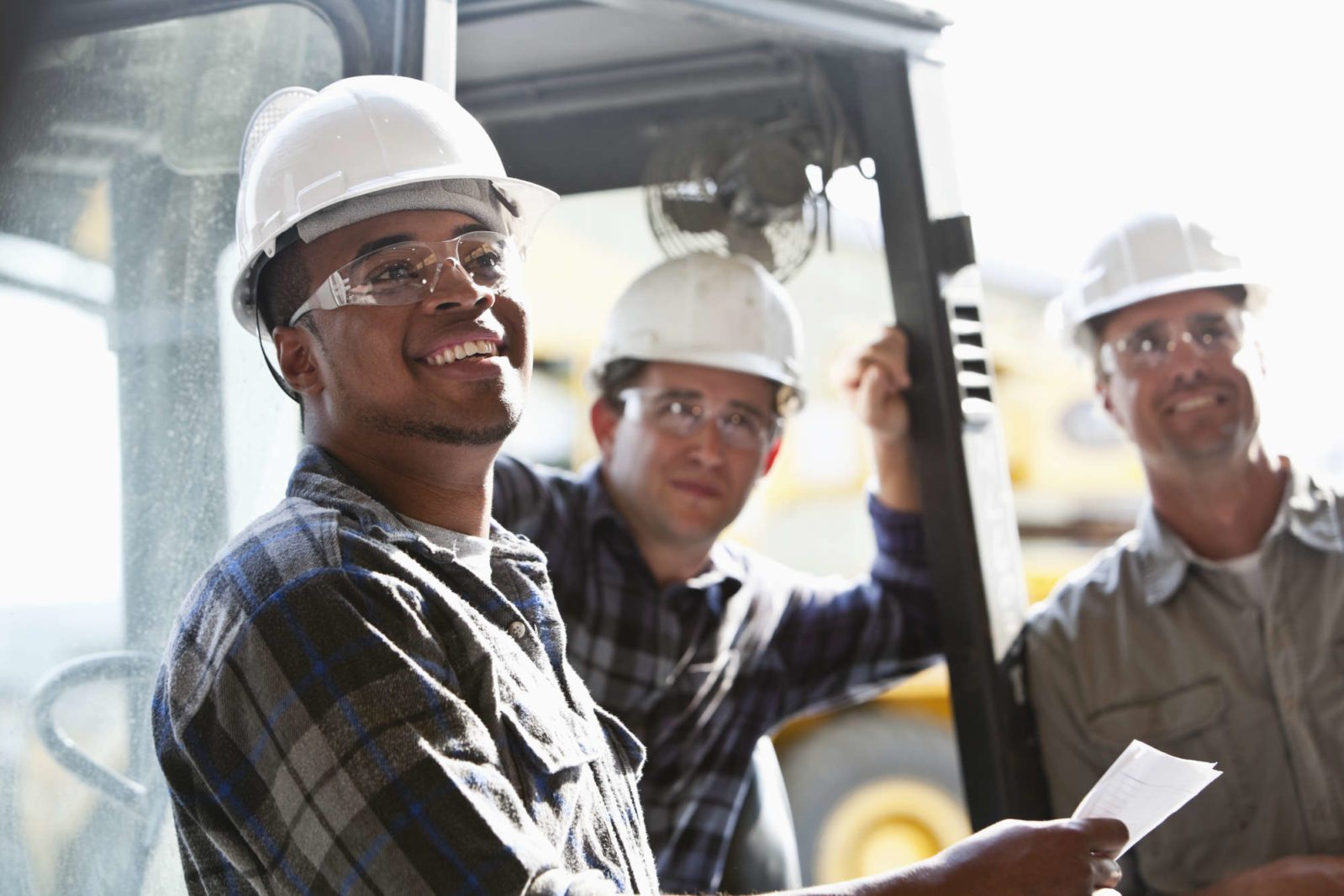 Industrial workers with forklift